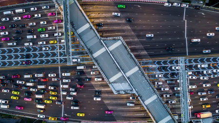 Aerial view cars waiting to pay at the expressway, Gate for expressway fee payment, Cars at gate for expressway fee payment, traffic jam with row of cars on expressway during rush hour.の写真素材