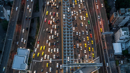 Aerial view cars waiting to pay at the expressway, Gate for expressway fee payment, Cars at gate for expressway fee payment, traffic jam with row of cars on expressway during rush hour.の写真素材