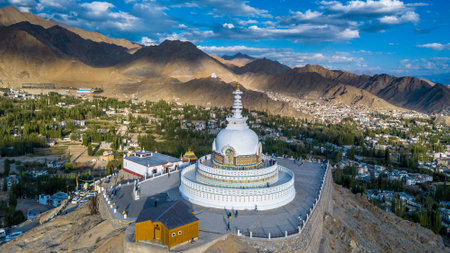 Aerial view Shanti Stupa buddhist white domed stupa overlooks the city of Leh, The stupa is one of the ancient and oldest stupas located in Leh city, Ladakh, Jammu Kashmir, India.の写真素材