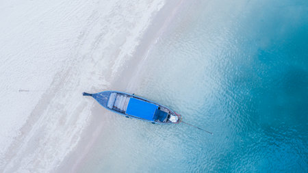 Aerial view of long tail boat is float on the emerald sea at Ao Nang Beach, Krabi, Thailand.の写真素材