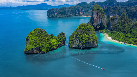 Aerial view Railay Beach and Phra Nang Cave Beach in beautiful bay in Krabi province, tropical coast with paradise beache, Krabi, Thailand.の写真素材