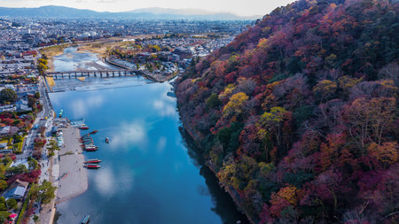 Arashiyama in autumn season along the river in Kyoto, Japan, Aerial view Arashiyama Togetsu or...