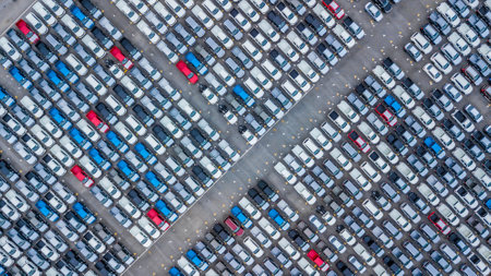 Aerial view new cars lined up in the port for import and export, Top view of new cars lined up automobile factory global logistic import export, New cars logistic to dealership for sale.の写真素材