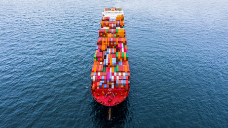 Container cargo ship at industrial port in import export business logistic and transportation...