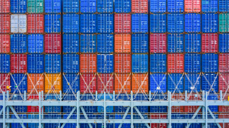 Container cargo ship at industrial port in import export business logistic and transportation...