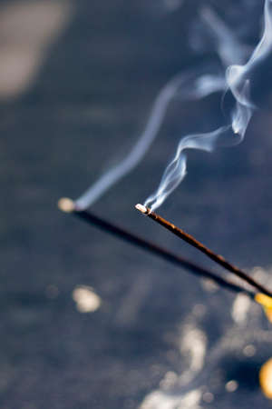 Incense Bamboo Stick with smoke,religious purpose.の写真素材
