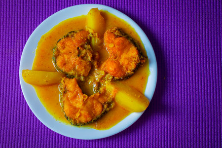 Bengali style delicious Rohu fish curry is ready to serve.
