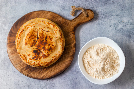 selective focus of famous bengali dish Ghugni made of chickpeas and potato.