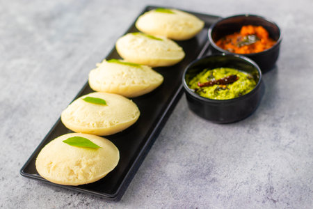 Traditional Indian sweet bhajiya served with green chutneyの写真素材