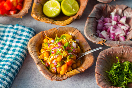 selective focus of famous bengali dish Ghugni made of chickpeas and potato.
