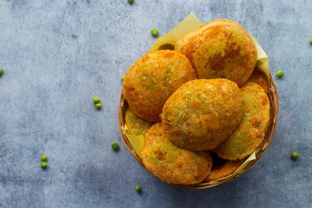 Indian food Matar ki kachori made of green peas and flour.