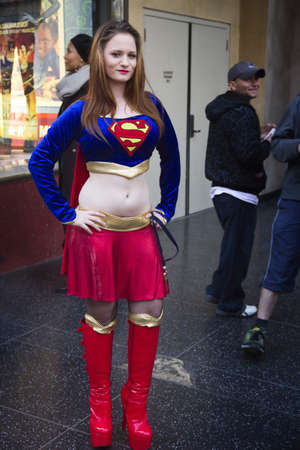 LOS ANGELES DECEMBER25th: Unidentified participant dressed as Super Girl poses in streets on December 25 2012 in Los Angeles USAのeditorial素材