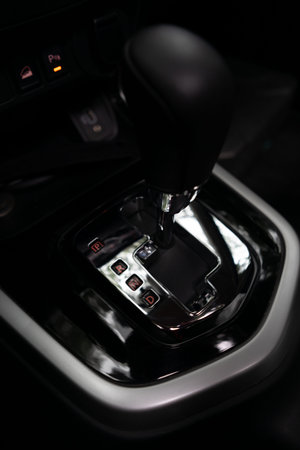 Top view of an automatic sport transmission lever, black and chrome details.の写真素材