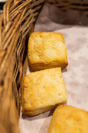 basket with homemade fat biscuits from a bakeryの写真素材