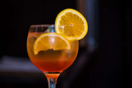 fruity cocktail on the bar of a barの写真素材