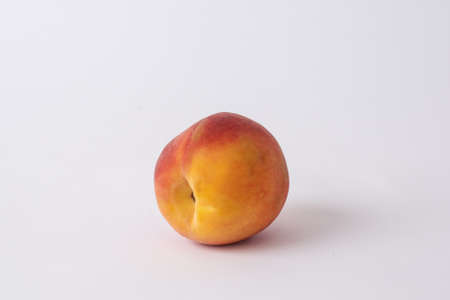 fresh peach on a white mezaの写真素材