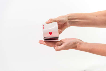 hand shuffling deck of cards to playの写真素材