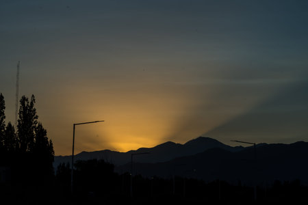 landscape in the shadows of a sunset, clear sky