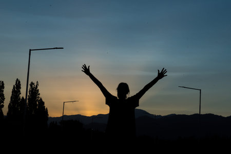 woman exercising outdoors under the night