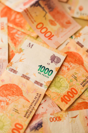 many messy 1000 Argentine peso billsの写真素材