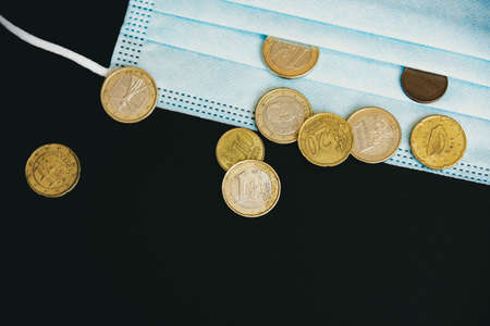 Medical face mask with moneyの写真素材