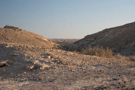 Beautiful lunar landscape. Wight and smooth hills in various shapes in a desert landscape. The whitish, rounded, winding, and smooth chalk rocks. Israel.の写真素材