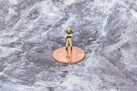 Block chain and Bitcoin safety or security trust concept, miniature figure security guard standing...