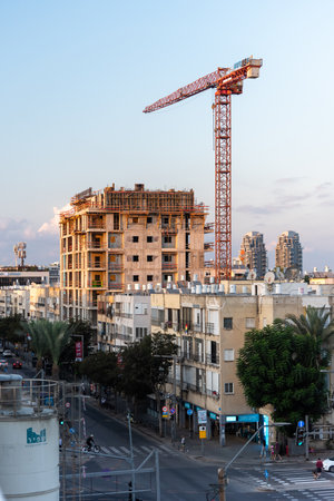 TEL AVIV, ISRAEL - MAY 01 2022: Construction work on Ibn Gvirol Street. Urban Renewals and light rail Construction. Light rail excavations. TMA38のeditorial素材