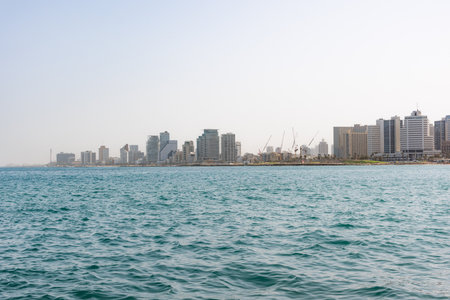 Tel Aviv skyline. A view from the water of the old Yaffa Portの写真素材