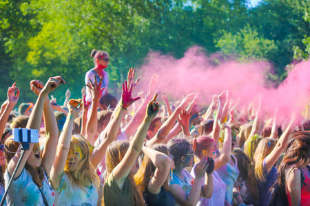 Vitebsk, Belarus - July 4, 2015: Throwing color at the Holi color festival