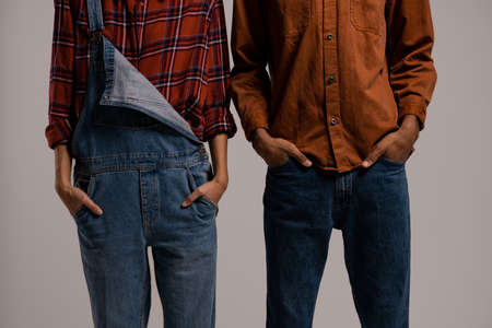 Close up photo of farmers look style. Denim overall and plaid shirtの写真素材