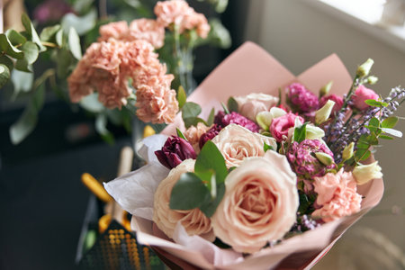 Nice and colorful bouqette of different flowers in flower shop. Close up.の写真素材