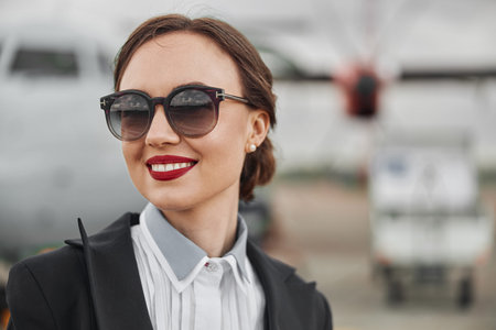 Portrait of female stewardess face close up
