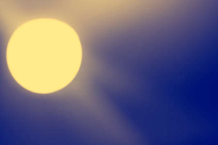 glowing circle on blue gradient backgroundの写真素材