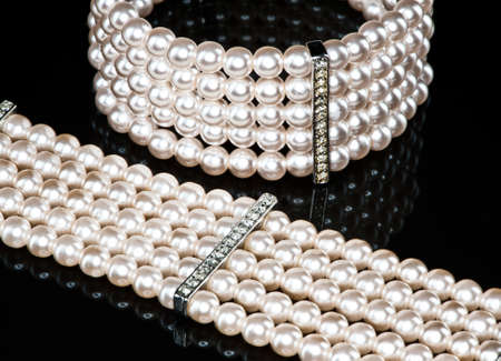 A pearl bracelet and a necklace (close-up)の写真素材