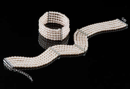 A pearl bracelet and a necklaceの写真素材