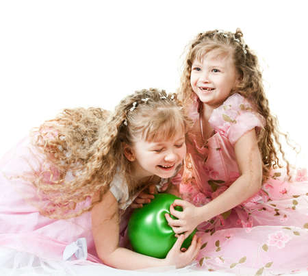 Twin sisters playingの写真素材