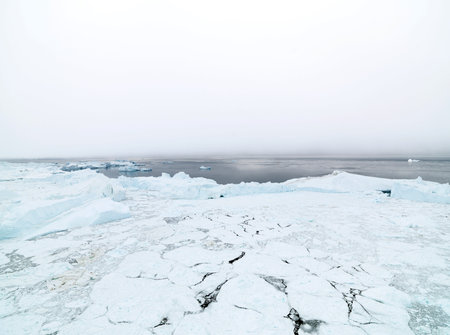 Icebergs on arctic ocean in Ilulissat icefjord, Greenland