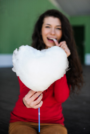 the girl with big heart from cotton candyの写真素材