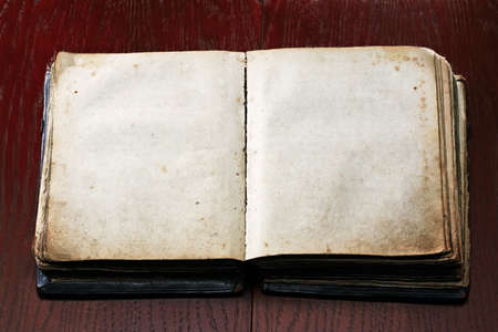 old book on wooden tableの写真素材