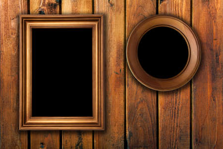 two vintage frames on wooden backgroundの写真素材