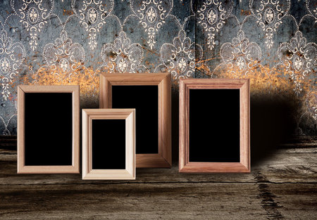 photo frames on old tableの写真素材