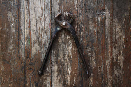 tool against wooden wallの写真素材