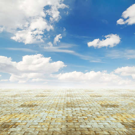 blue sky and yellow brick floor, background の写真素材