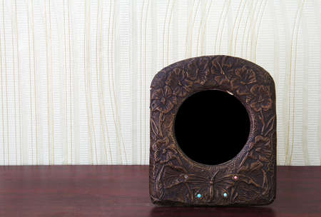 vintage photo-frame on tableの写真素材