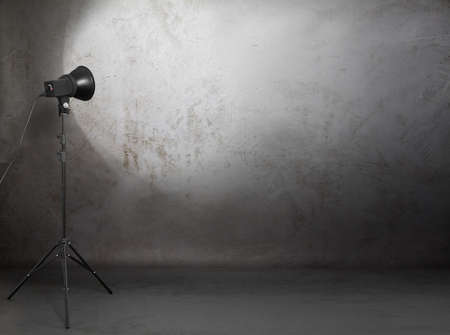 photo studio in old grunge room with concrete wall, urban background