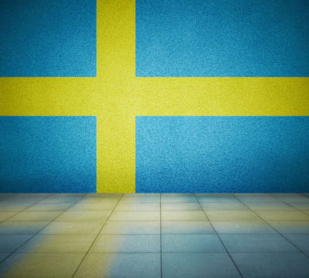Sweden flag on the wall in empty room, studio backgroundの写真素材