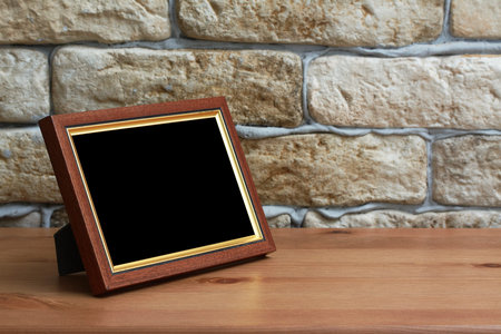 old photo frame on the wooden table