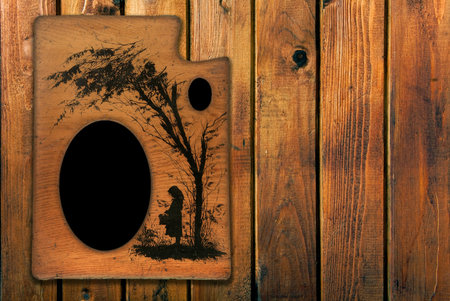 vintage image frame on wooden backgroundの写真素材