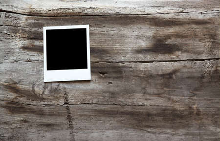 photo on old wooden backgroundの写真素材